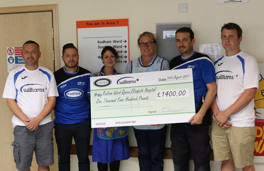 Williams and Fosters Players present check to Rudham Ward.